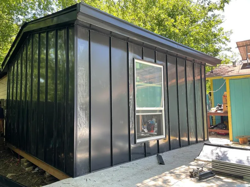 Black standing seam metal wall panels for Roof Inspection in Buffalo Grove