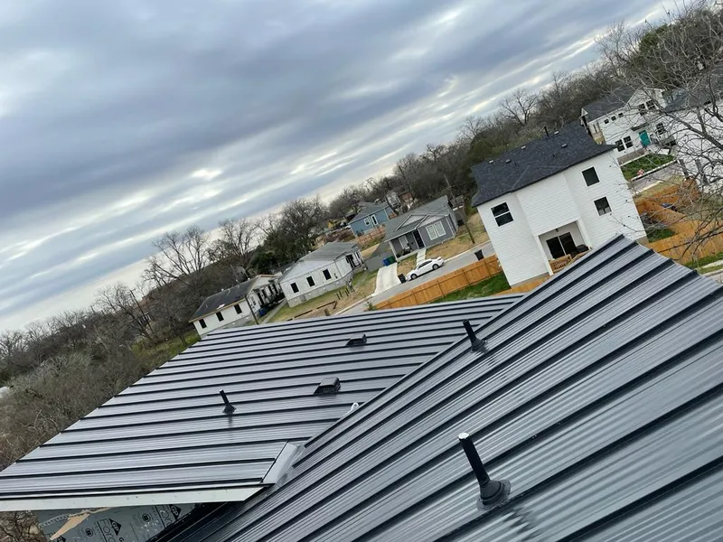 Standing seam metal roof panels with vents for Skylight Repair in Buffalo Grove
